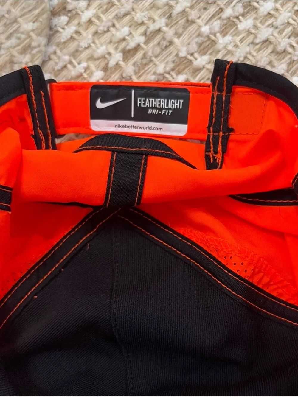 Nike feather light Orange Performance Cap with Swoosh